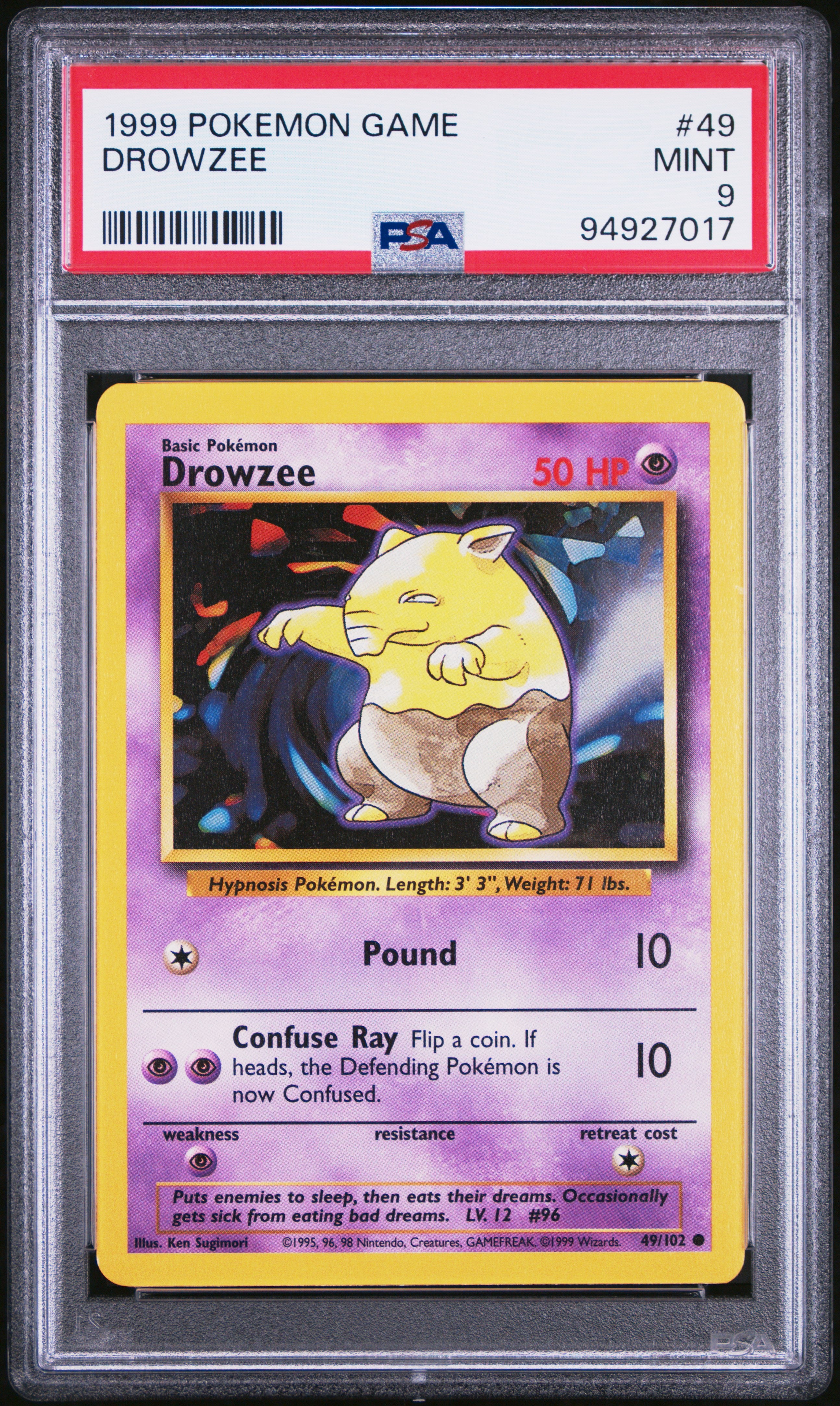 This 1999 Pokemon card features Drowzee, a psychic-type Pokemon from the original Base set. It has been professionally graded by PSA and received a high score of 9, making it a great addition to any collector's deck. Don't miss the chance to own a piece of Pokemon history!